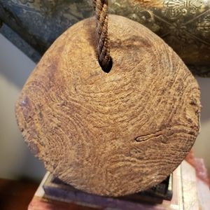 Primative looking cow bell.